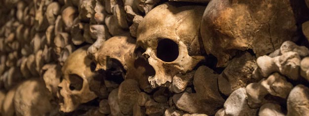 Visit the Catacombs of Paris and experience the underground graveyard of six million people! Book your tickets today and skip the line to the Catacombs!