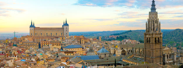 Nyt en heldagstur til Toledo fra Madrid. Transport inkl. Besøk en moské, kirke og synagoge. Nyt vinsmaking i Bargas. Bestill billetter på nettet! 