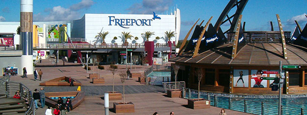 Embarque no translado ao Freeport Outlet, fora de Lisboa. Aproveite mais de 140 lojas e marcas famosas. Ganhe 10% de desconto c/ cartão VIP. Reserve já!