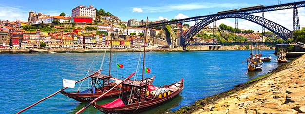 Bli med oss på den ultimate halvdags turen i Porto! Guidet tur rundt Porto, besøk en portvinskjeller, smak litt lokal vin og nyt et cruise. Bestill på nett!